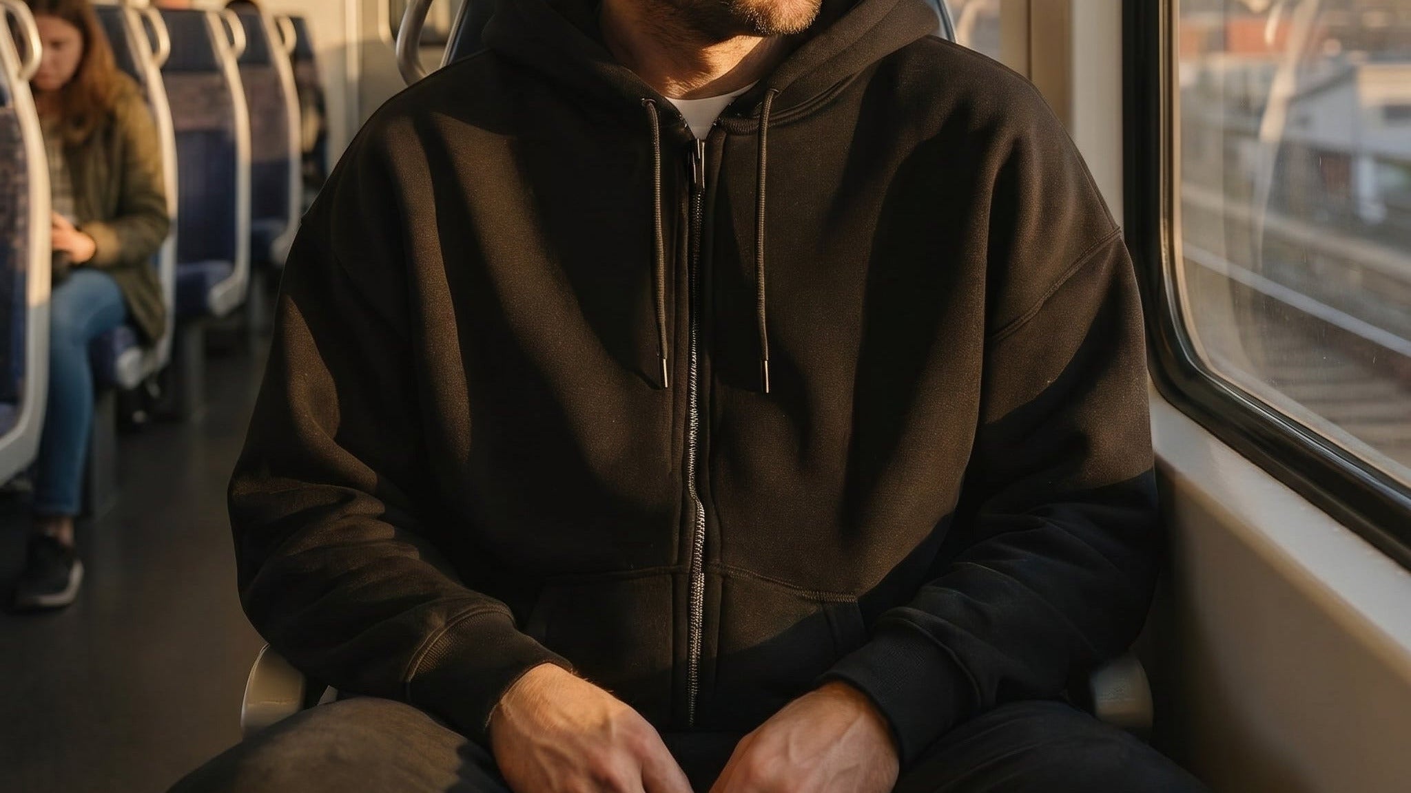 Kavva weighted hoodie worn on train