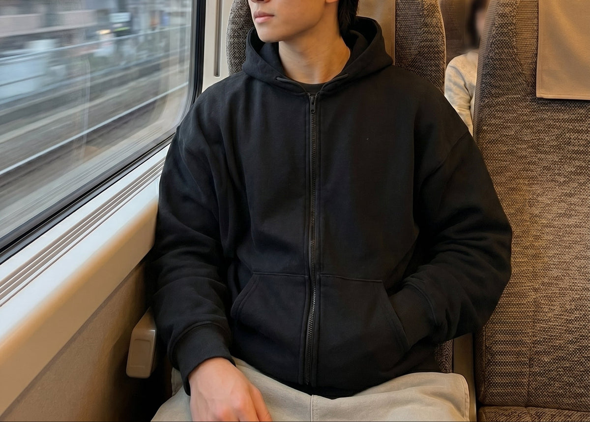 Kavva weighted hoodie worn on train